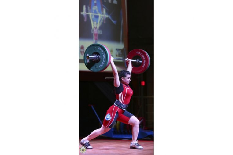 Штанга женская DHS Olympic L220 см D50мм для соревнований 185 кг (IWF) фото 1